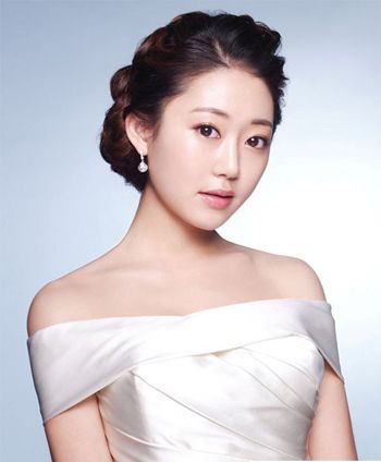 圆脸美眉怎样盘发 脸圆盘新娘发型图片(3)_发型